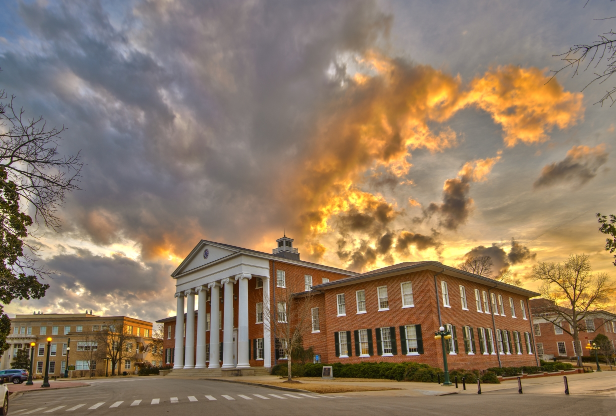 View of Lyceum building with a sunset sky