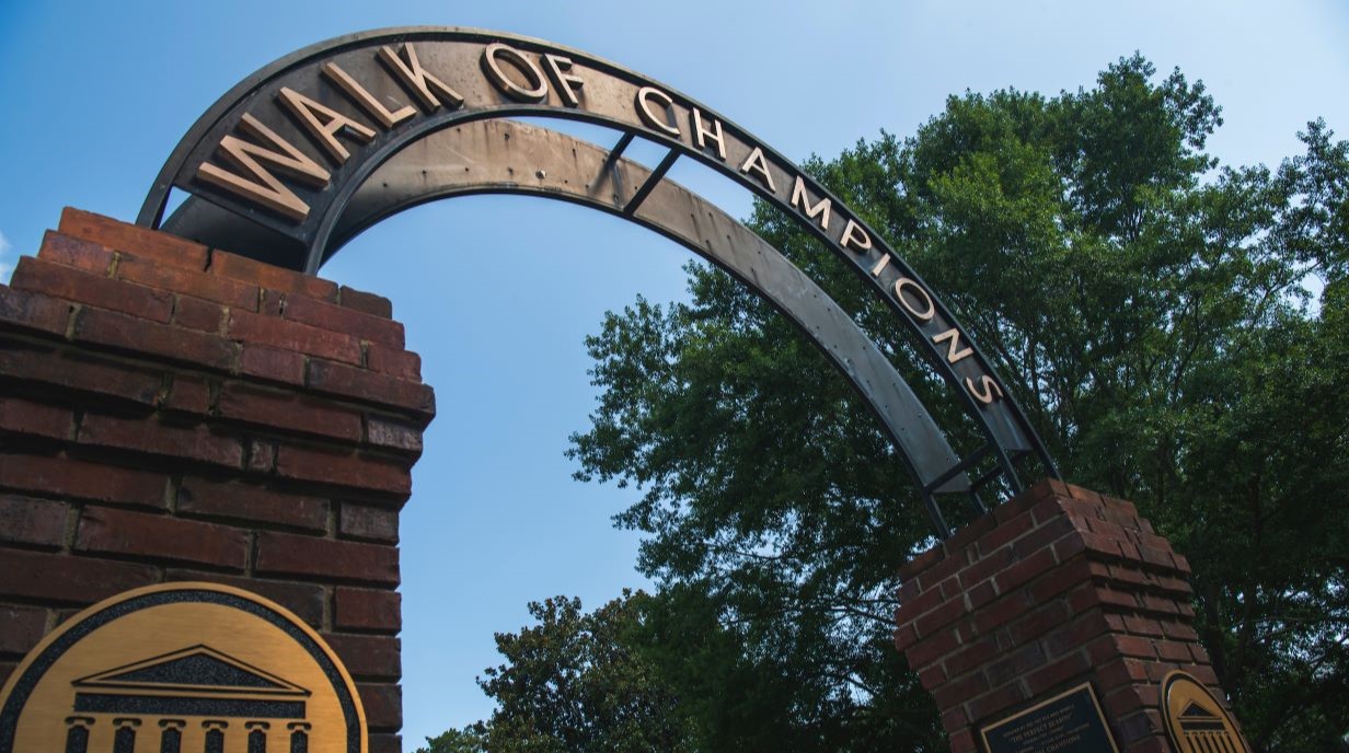 image of entrance arch to Walk of Champions in Grove of Ole Miss campus