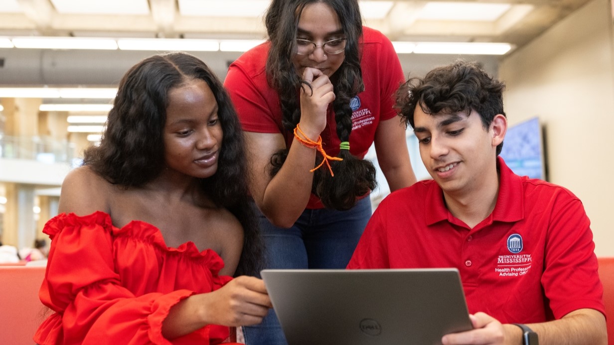 three students studying together in the Union