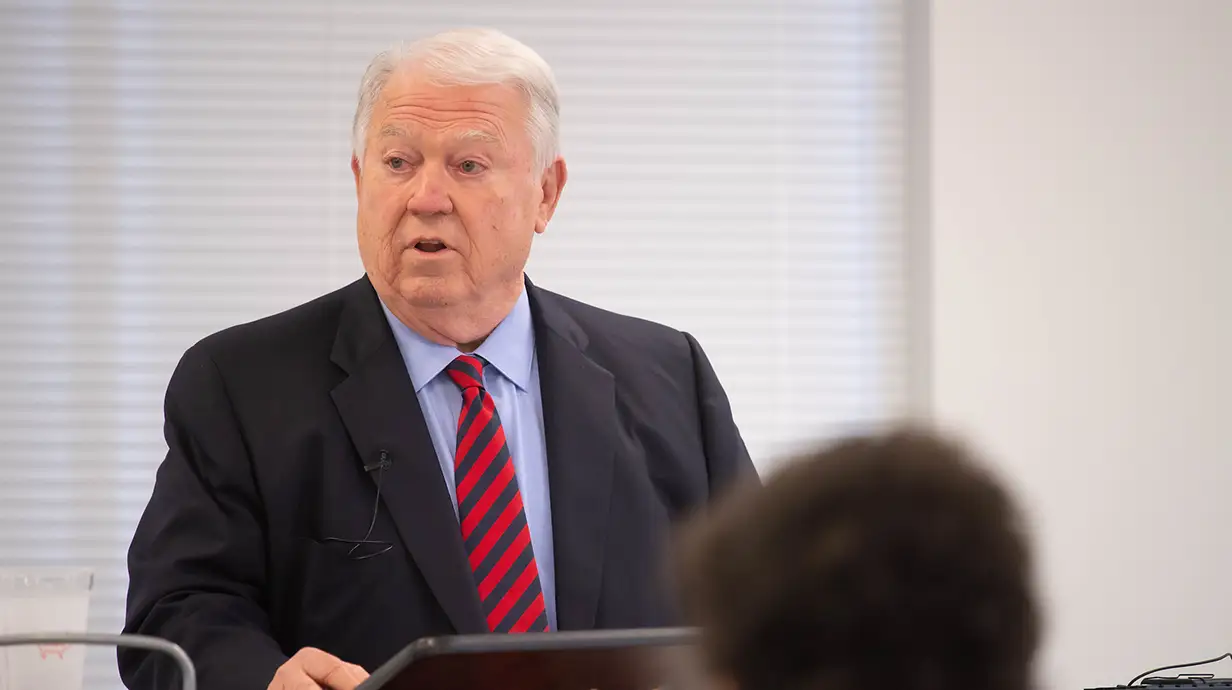 Governor Haley Barbour speaking at podium