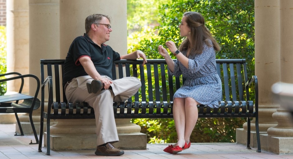 image of Dan O'Sullivan talking with a student