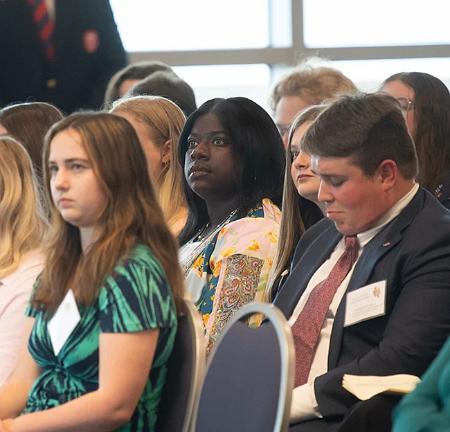 people sitting in audience 
