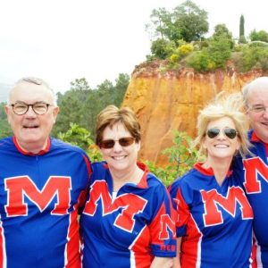 UM alumni Frances and Hume Bryant (right) and Bruce and Mary Betsy Bellande (left) of Oxford, Miss. enjoy a ten day cycling trip through the Provence region of France in 2014 while sporting their UM jerseys.