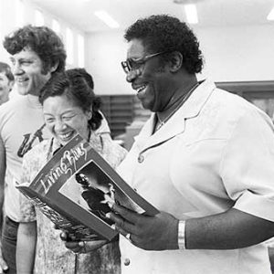 B.B. King (right) reads Living Blues magazine during a visit to UM.