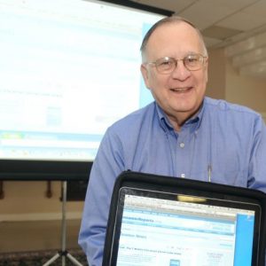 Dr. Lee N. Bolen has been honored with a scholarship fund in his name at UM. Pictured here, Bolen also offered his time in the community by teaching courses on computer technology for senior citizens.