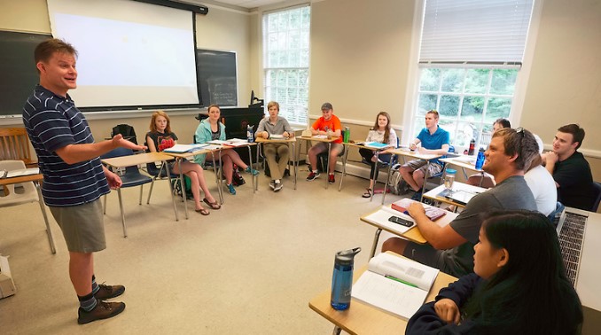 Allen Clark (at board), co-director of the UM Arabic Language Flagship Program, teaches an intensive Arabic class. In its first year as a Language Flagship Program, the UM Arabic program achieved a 100 percent acceptance rate for its students into the prestigious capstone year. Photo by Robert Jordan/Ole Miss