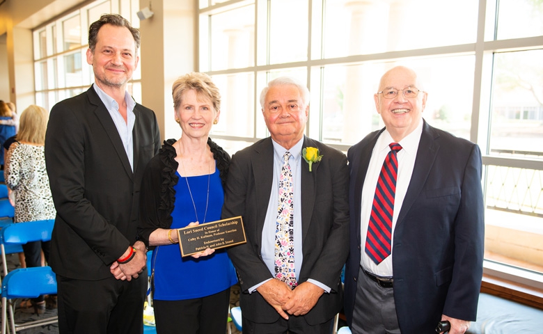 Members of the late Lori Sneed’s family – (from left) brother, Johnny; mother, Patti; and father, Shorty Sneed – are joined by honoree Colby Kullman at a recent Ole Miss Women’s Council Rose Garden Ceremony. Photo by Bill Dabney