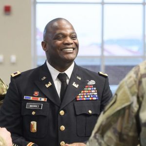 Col. Kelvin Nichols greets fellow Mississippi Army National Guardsmen after a ceremony to promote him to colonel. Nichols has been employed by the University of Mississippi for 25 years. Photo by Thomas Graning