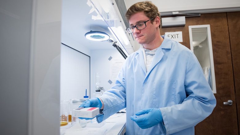UM chemistry graduate student Austin Scircle, of Powell, Tennessee, works in chemistry professor James Cizdziel’s lab researching microplastics. Photo by Megan Wolfe