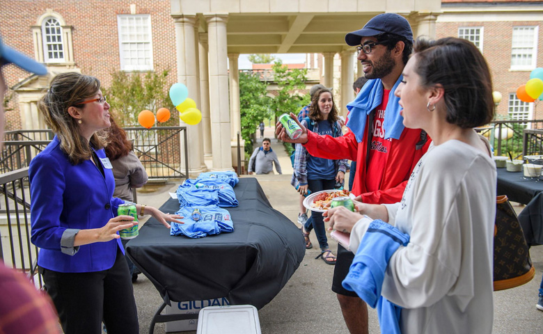 Anne Twitty (left), associate professor of history, greets students during the Department of History’s undergraduate open house outside of Bishop Hall on the Oxford campus.