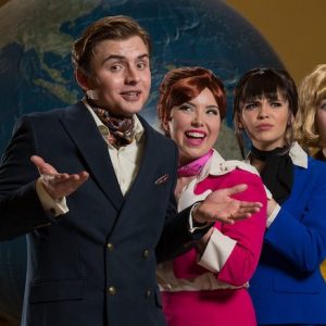 Keeton Landfair (left) plays Bernard, an American playboy in Paris who is juggling three fiancees, all airline stewardesses, played by Lydia Meyers, Elizabeth Burrow and Hannah Bosworth, in the Ole Miss Theatre production of ‘Boeing, Boeing.’ Photo by Kevin Bain/Ole Miss