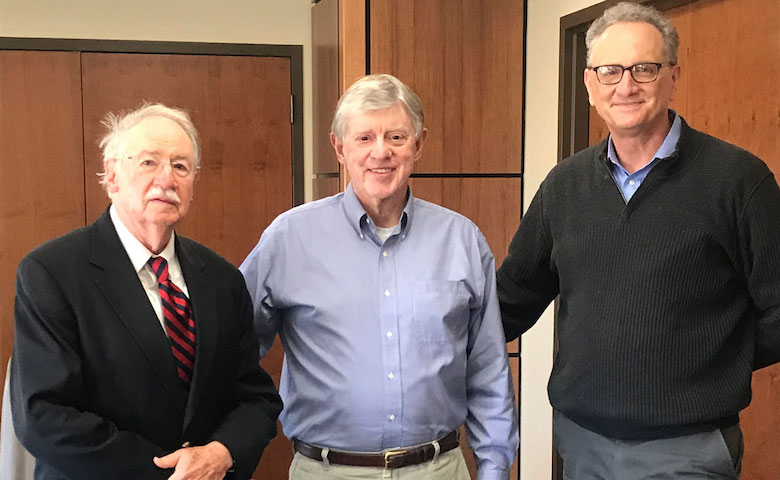 Honorees (from left) Vaughn Grisham and John Winkle are pictured at the Sally McDonnell Barksdale Honors College with Dean Doug Sullivan-Gonzalez.