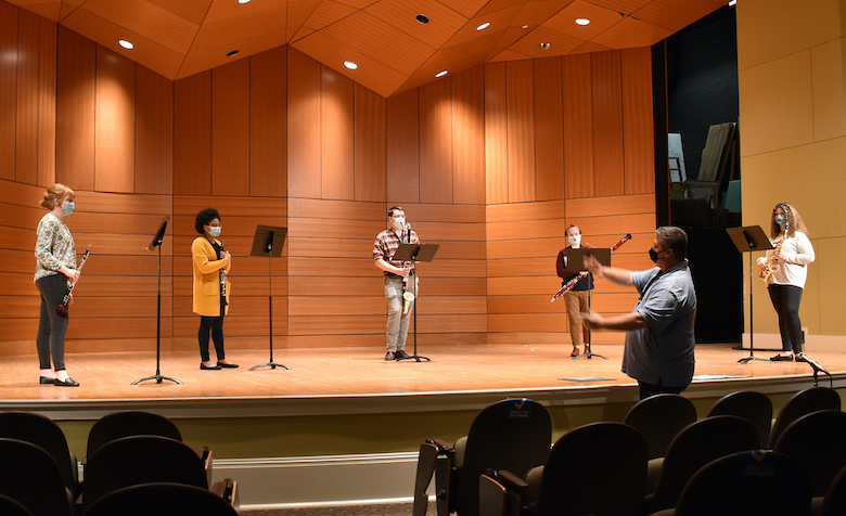 UM music professor Adam Estes (front right) coaches the Ole Miss Reed Quintet between takes of a recording session in Nutt Auditorium. Photo by Lynn Adams Wilkins/Department of Music