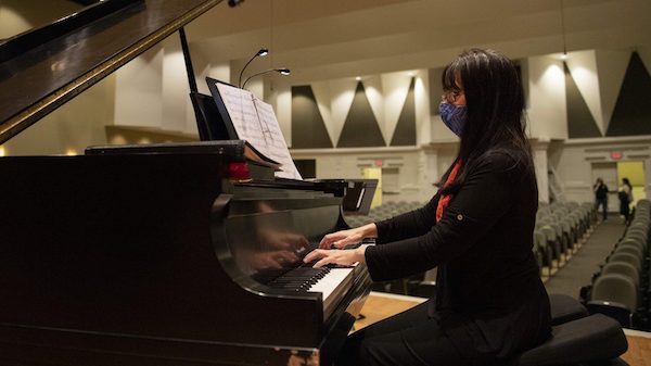 Adrienne Park, UM instructor of piano, prepares for a recent performance of ‘Lily of the Valley,’ a piano prelude she commissioned from composer Stephanie Ann Boyd. Photo by Logan Kirkland/ Ole Miss Digital Imaging Services