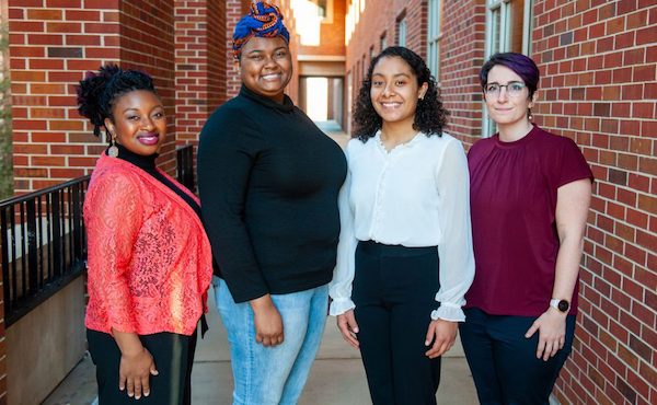 Annexstad Honors College scholars Ajah Singleton and Elsi Muñoz Ramos (second and third from left) are pictured with Rachel Coleman (left), Minority Engagement Council advisor, and Ashleen Williams, faculty mentor for the First-Generation Student Network.