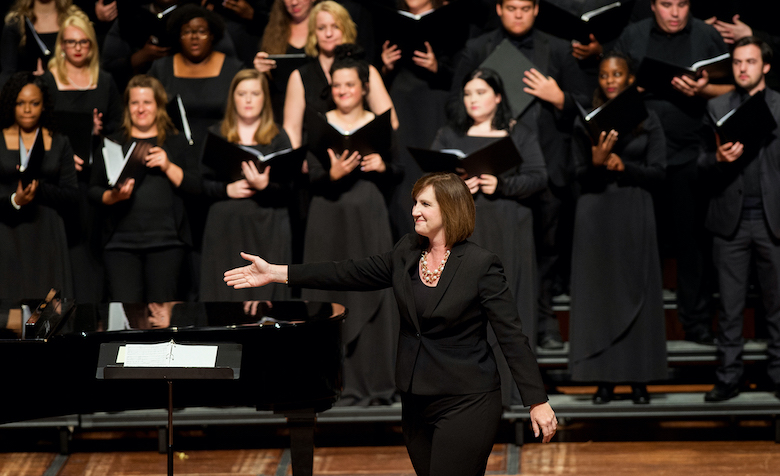 Libby Hearn, UM assistant professor of choral music education, conducts a performance of the University Choirs in the Gertrude C. Ford Center for the Performing Arts. Photo by Christian Johnson/Ole Miss Digital Imaging Services
