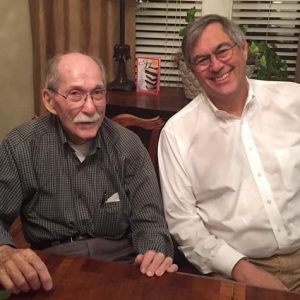 Luther Knight (left) and son Scott spend time together at home. Submitted photo