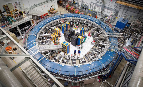 The core component of the Muon g-2 experiment at the Fermi National Accelerator Laboratory is a 50-foot superconducting electromagnet. UM physicist Breese Quinn is among the collaborators on the project that searches for hidden particles and forces. 