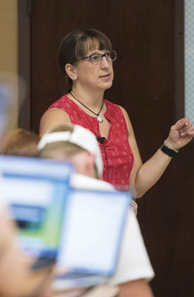 Dr. Rebecca Symula teaching class