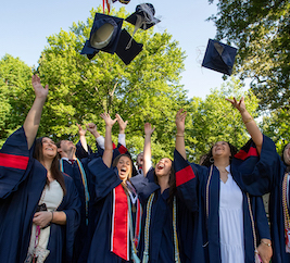 A group of 2022 graduates celebrates in the Grove. The university’s 170th Commencement begins Wednesday (May 10) and continues through Sunday (May 14) on the Ole Miss campus. The main Convocation ceremony is set for 8 a.m. Saturday in the Grove. Photo by Thomas Graning/Ole Miss Digital Imaging Services